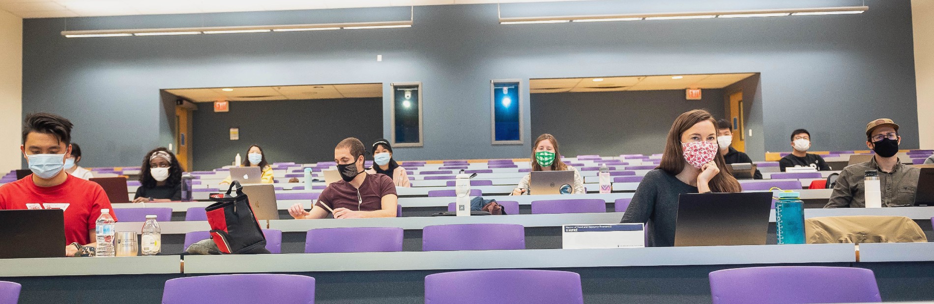 UBC students in a lecture hall wearing masks